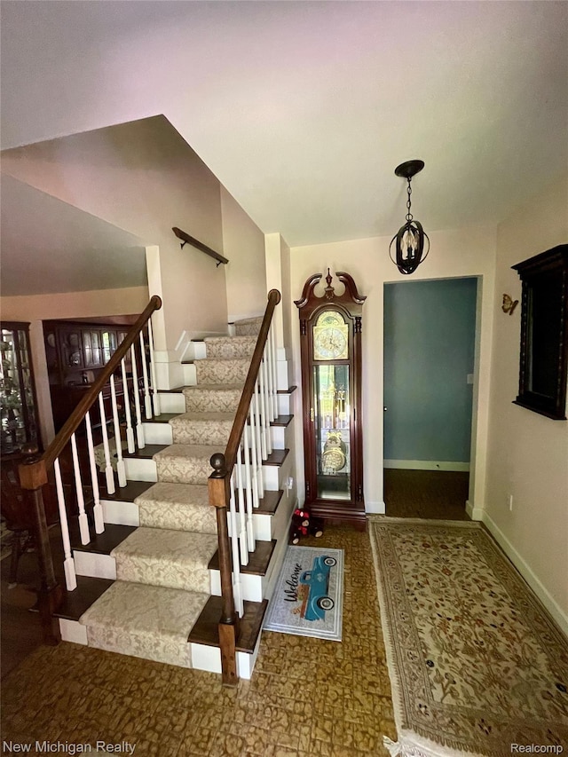 6567 Heaven Dr, Howell, MI 48855 - entryway with stairway and baseboards