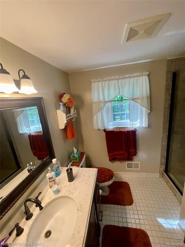 6567 Heaven Dr, Howell, MI 48855 - bathroom featuring healthy amount of natural light, toilet, vanity, and tiled shower