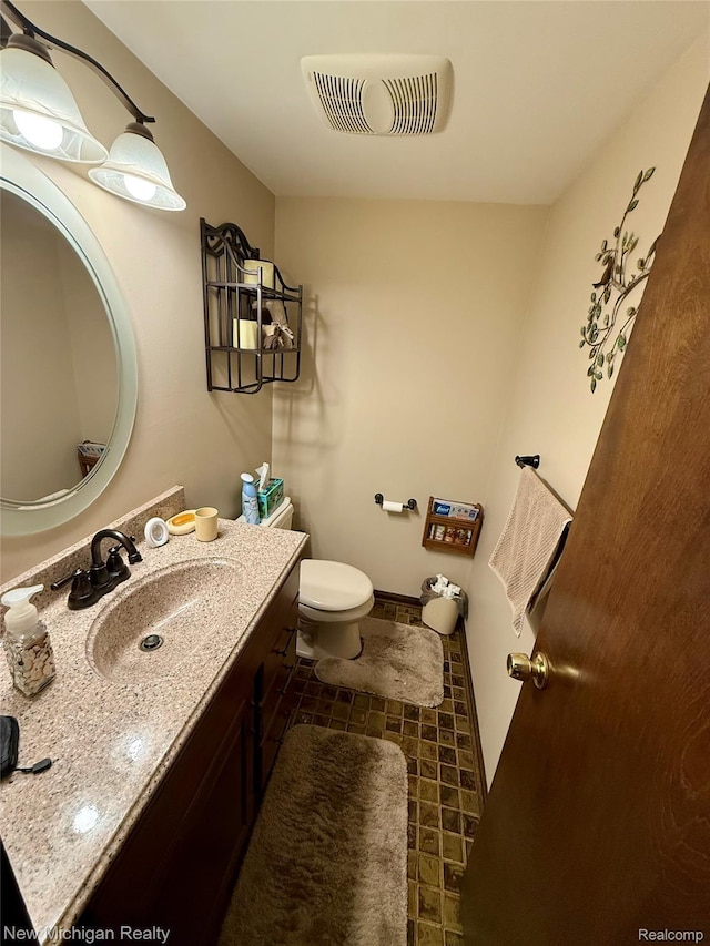 6567 Heaven Dr, Howell, MI 48855 - half bath with vanity and toilet