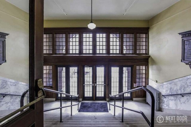 600 NW Broadway Ave Unit 318, Grand Rapids, MI 49504 - doorway to property with french doors
