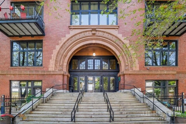 600 NW Broadway Ave Unit 318, Grand Rapids, MI 49504 - view of exterior entry featuring brick siding