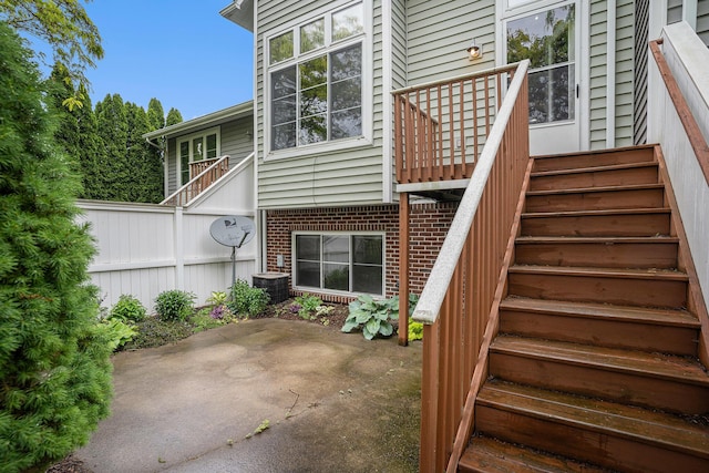302 NE Xing, Holland, MI 49423 - view of patio / terrace with stairs
