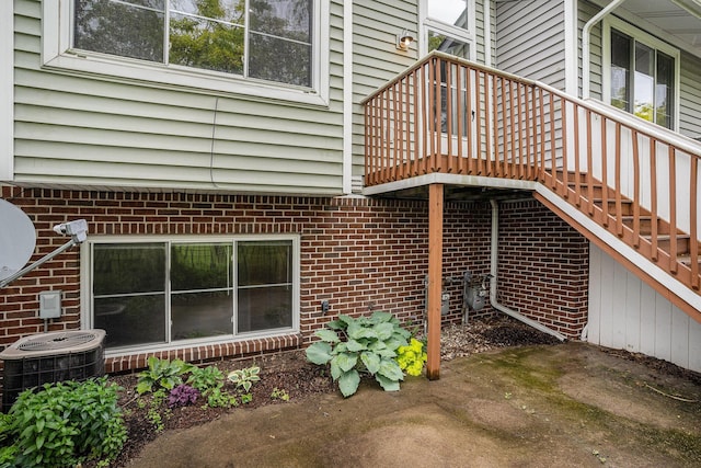 302 NE Xing, Holland, MI 49423 - exterior space with central air condition unit and stairway