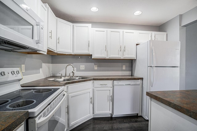 302 NE Xing, Holland, MI 49423 - kitchen with white appliances, a sink, white cabinetry, and recessed lighting