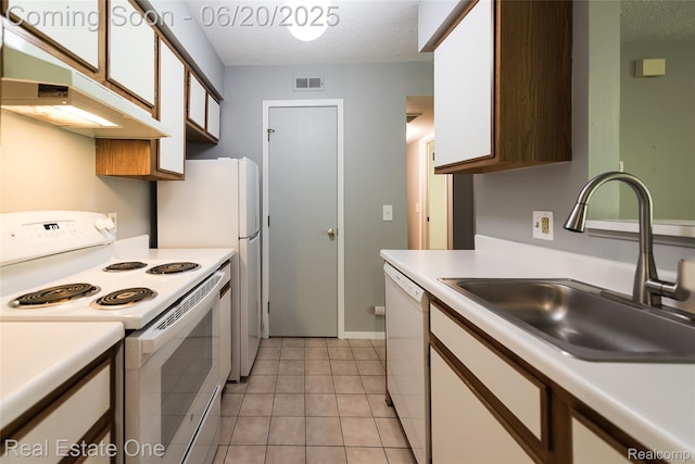 410 Spring Brooke Dr, Brighton, MI 48116 - kitchen featuring white appliances, ventilation hood, light countertops, white cabinetry, and a textured ceiling
