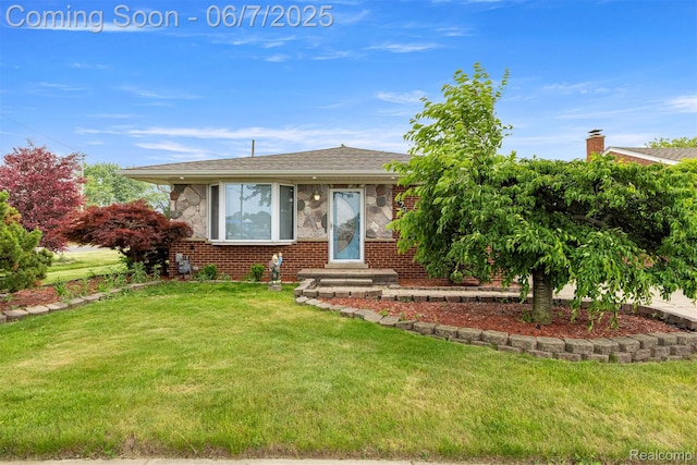 8786 N Evangeline St, Dearborn Heights, MI 48127 - view of front of home featuring a front lawn, brick siding, and stone siding