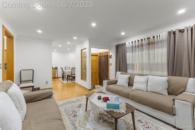 8786 N Evangeline St, Dearborn Heights, MI 48127 - living area with light wood-style floors and recessed lighting
