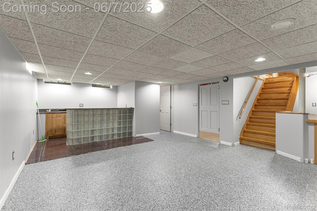 8786 N Evangeline St, Dearborn Heights, MI 48127 - finished basement with bar area, baseboards, stairs, recessed lighting, and a paneled ceiling