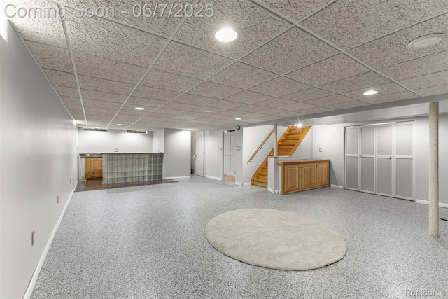 8786 N Evangeline St, Dearborn Heights, MI 48127 - finished basement with baseboards, bar area, stairway, recessed lighting, and a paneled ceiling