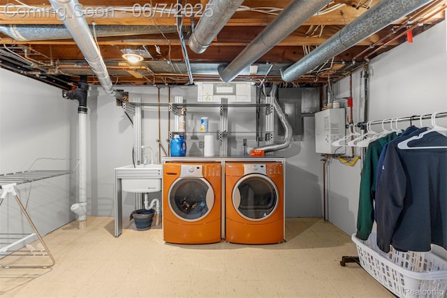 8786 N Evangeline St, Dearborn Heights, MI 48127 - basement with washer and dryer, tile patterned floors, and a sink