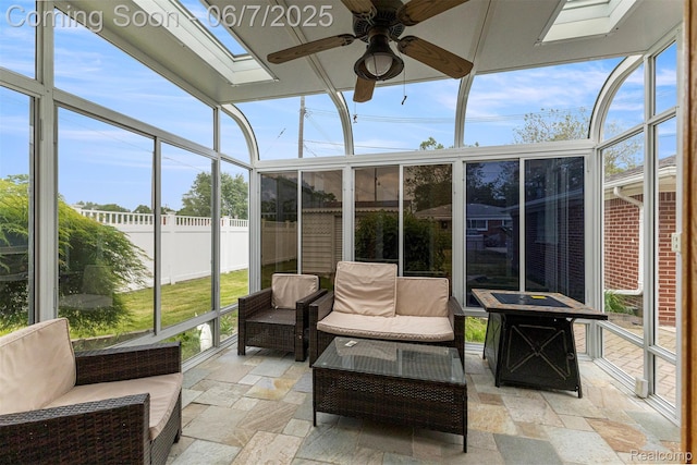 8786 N Evangeline St, Dearborn Heights, MI 48127 - sunroom featuring ceiling fan, a skylight, and plenty of natural light