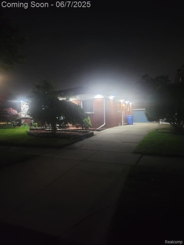 8786 N Evangeline St, Dearborn Heights, MI 48127 - view of property hidden behind natural elements with driveway