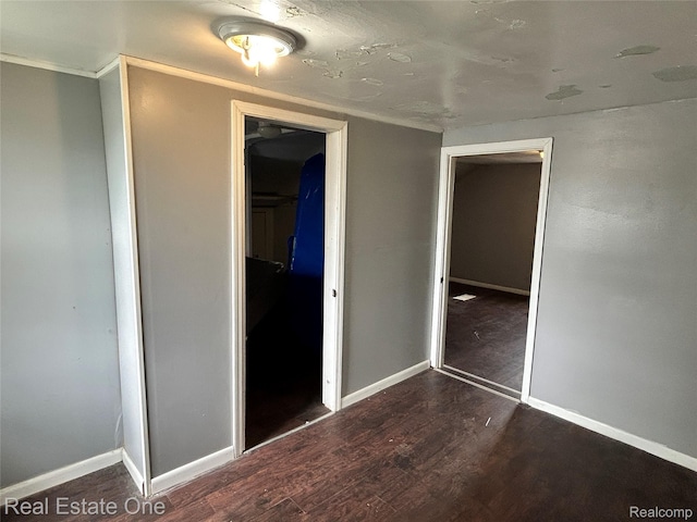 16857 Cheyenne St, Detroit, MI 48235 - unfurnished bedroom with wood finished floors and a closet