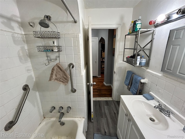 16857 Cheyenne St, Detroit, MI 48235 - bathroom with wood finished floors, vanity, and shower / washtub combination