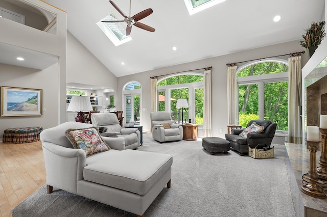 7843 Shepherds Glen Ct, Kalamazoo, MI 49009 - living room featuring a skylight, high vaulted ceiling, a ceiling fan, plenty of natural light, and recessed lighting