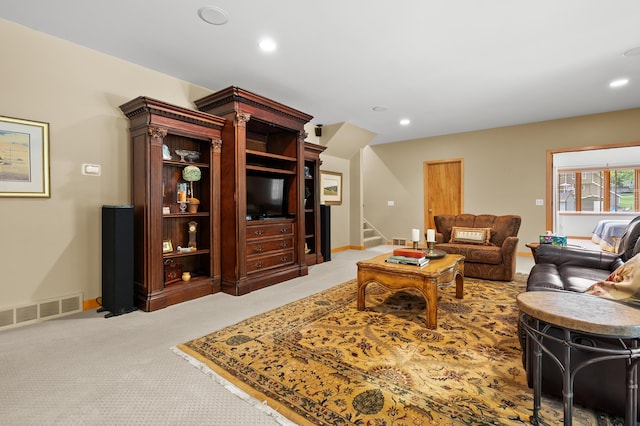 7843 Shepherds Glen Ct, Kalamazoo, MI 49009 - living room with stairway, recessed lighting, and light carpet