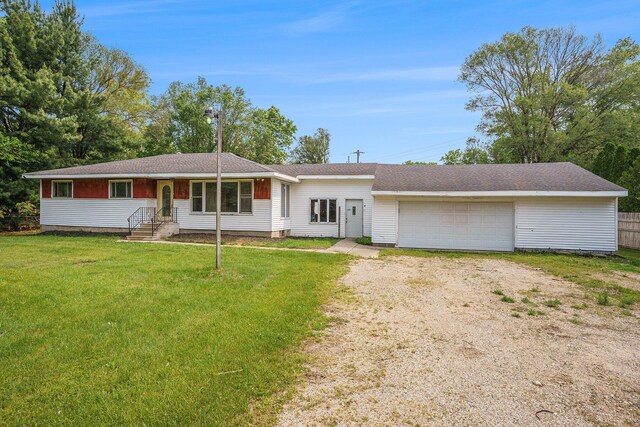 61473 M 40, Paw Paw, MI 49079 - ranch-style house with driveway, an attached garage, and a front lawn