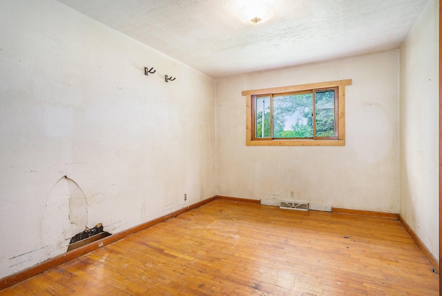61473 M 40, Paw Paw, MI 49079 - empty room with light wood finished floors and baseboards