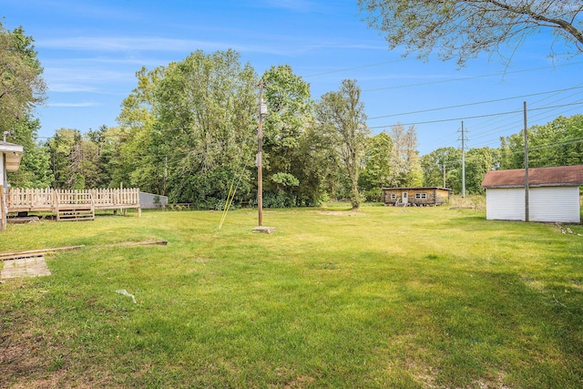 61473 M 40, Paw Paw, MI 49079 - view of green lawn featuring a deck