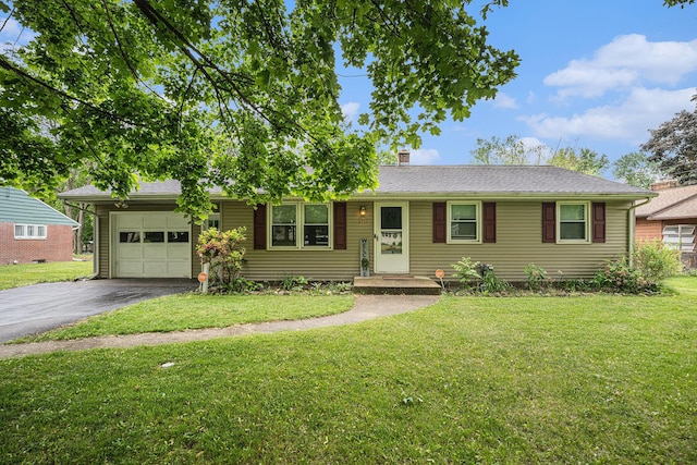 3717 Pontiac Ave, Kalamazoo, MI 49006 - single story home with asphalt driveway, a chimney, an attached garage, and a front yard