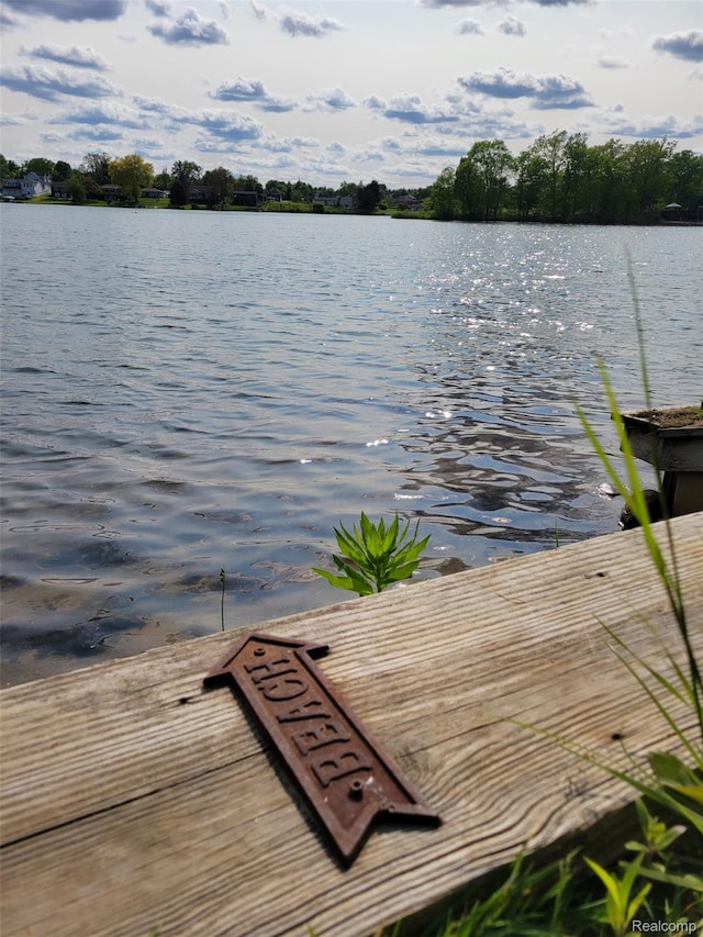 9635 Norman Rd, Clarkston, MI 48348 - dock area featuring a water view