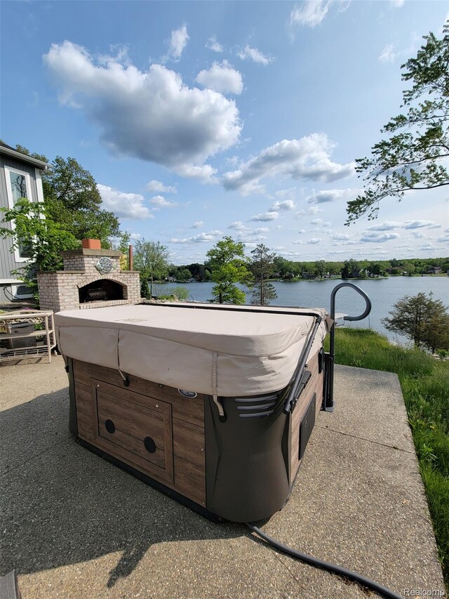9635 Norman Rd, Clarkston, MI 48348 - view of patio featuring a water view
