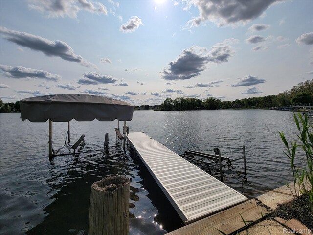 9635 Norman Rd, Clarkston, MI 48348 - dock with boat lift and a water view