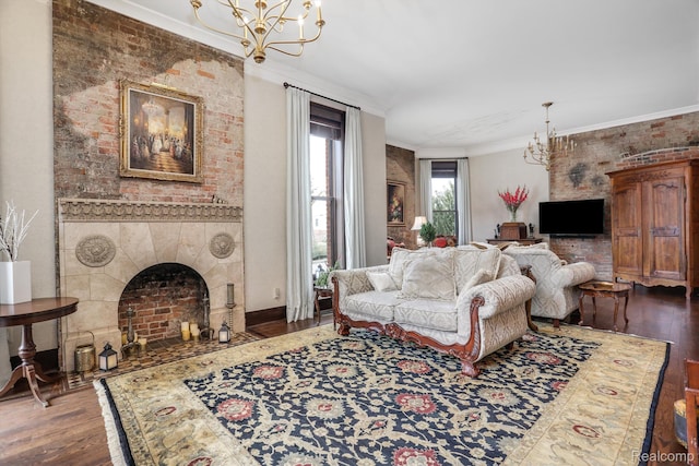205 Alfred St Unit A, Detroit, MI 48201 - living room with a chandelier, hardwood / wood-style floors, a tile fireplace, and ornamental molding