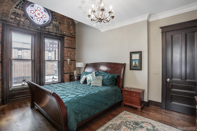 205 Alfred St Unit A, Detroit, MI 48201 - bedroom with a chandelier, wood finished floors, baseboards, and crown molding