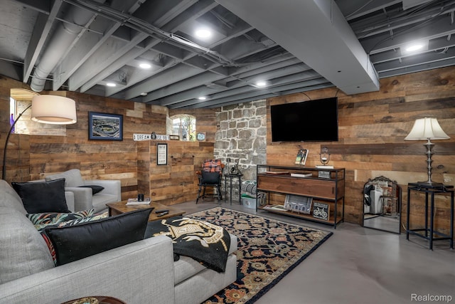 205 Alfred St Unit A, Detroit, MI 48201 - living room with finished concrete floors and wood walls