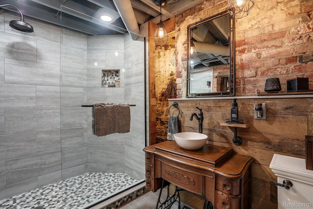 205 Alfred St Unit A, Detroit, MI 48201 - full bathroom with a stall shower, toilet, and vanity
