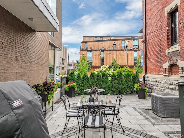 205 Alfred St Unit A, Detroit, MI 48201 - view of patio with central AC unit and area for grilling