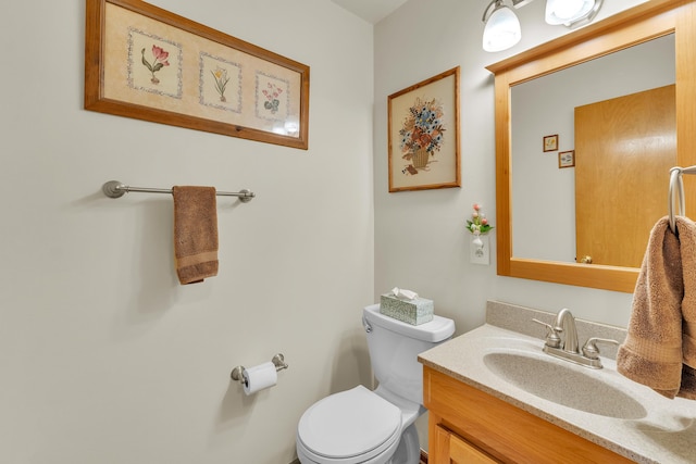 6676 Ralaric Dr, Dexter, MI 48130 - bathroom featuring vanity and toilet