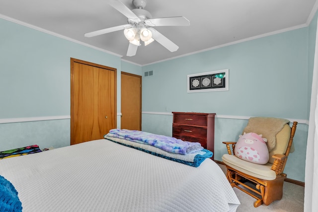 6676 Ralaric Dr, Dexter, MI 48130 - bedroom with ornamental molding, a closet, a ceiling fan, and carpet