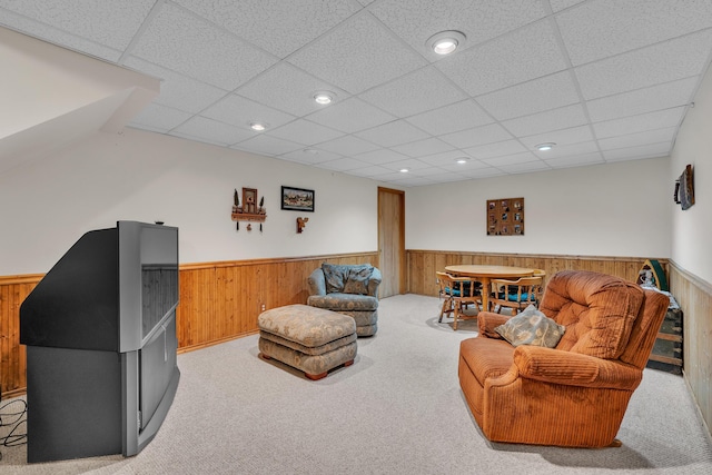 6676 Ralaric Dr, Dexter, MI 48130 - carpeted living area featuring wainscoting, a paneled ceiling, wooden walls, and recessed lighting