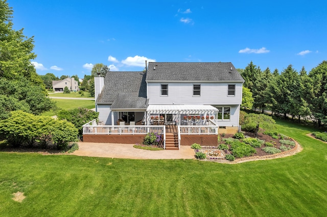 6676 Ralaric Dr, Dexter, MI 48130 - rear view of property featuring a wooden deck, a yard, and a chimney