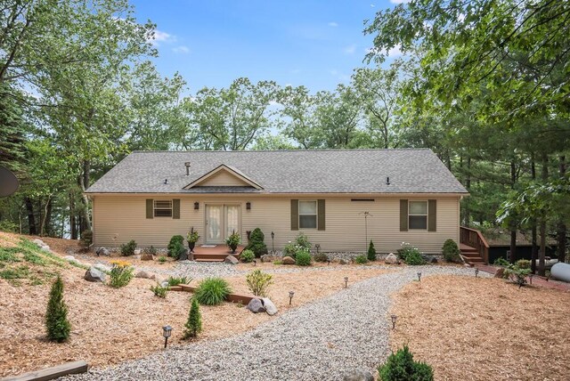 8833 W Velt Ave, Baldwin, MI 49304 - ranch-style house featuring a shingled roof
