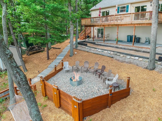 8833 W Velt Ave, Baldwin, MI 49304 - view of yard with a patio, a wooden deck, stairway, and a hot tub