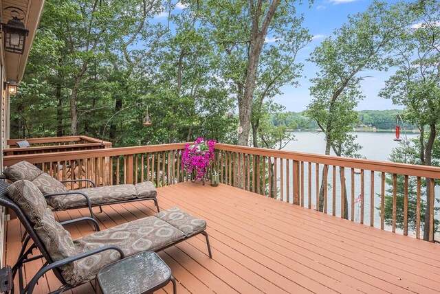 8833 W Velt Ave, Baldwin, MI 49304 - wooden terrace featuring a water view and view of wooded area