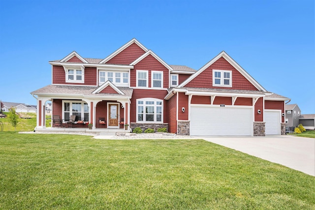 1162 Cooks Corner Ct SE, Byron Center, MI 49315 - craftsman-style house featuring covered porch, stone siding, a front lawn, concrete driveway, and a garage