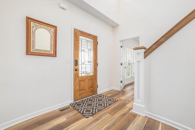 1162 Cooks Corner Ct SE, Byron Center, MI 49315 - entrance foyer with wood finished floors and baseboards