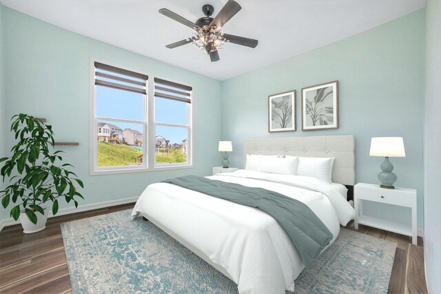 1162 Cooks Corner Ct SE, Byron Center, MI 49315 - bedroom featuring baseboards, dark wood-style floors, and a ceiling fan