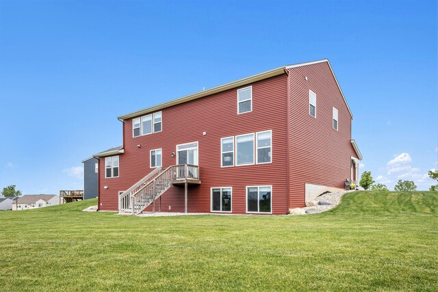 1162 Cooks Corner Ct SE, Byron Center, MI 49315 - rear view of property with a lawn