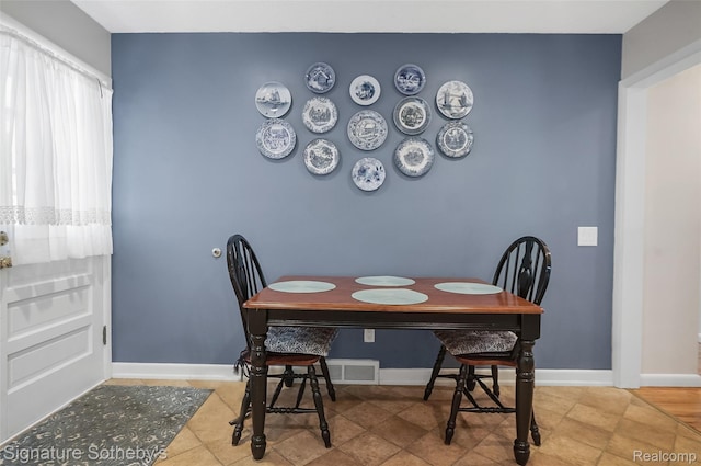 300 Cornell St, Howell, MI 48843 - dining room with baseboards