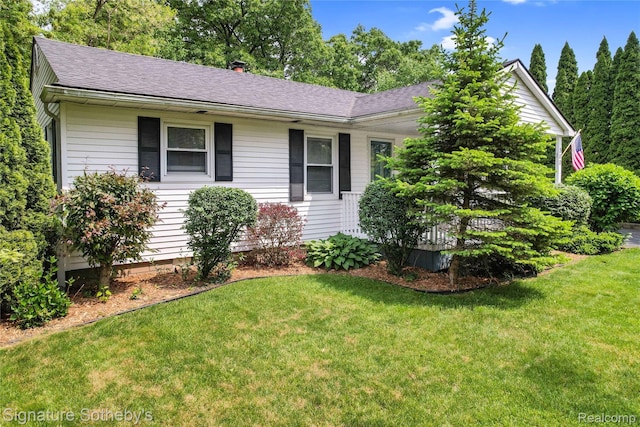 300 Cornell St, Howell, MI 48843 - ranch-style house featuring a shingled roof and a front lawn