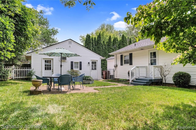 300 Cornell St, Howell, MI 48843 - back of house featuring a patio