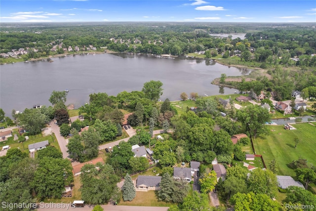 300 Cornell St, Howell, MI 48843 - aerial view of property's location featuring a nearby body of water and nearby suburban area