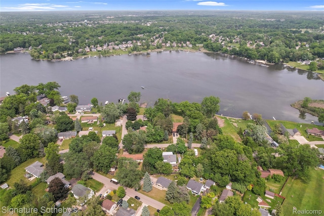 300 Cornell St, Howell, MI 48843 - aerial view of property and surrounding area featuring a nearby body of water and nearby suburban area