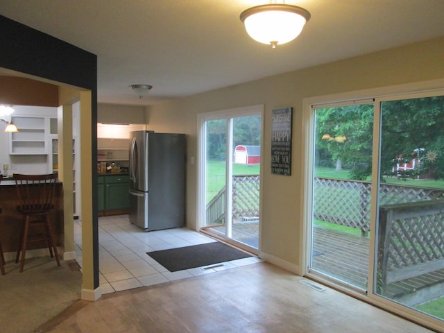 6005 Saint Joseph Ave, Stevensville, MI 49127 - doorway with light wood finished floors