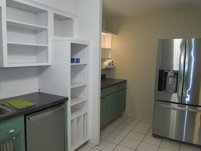 6005 Saint Joseph Ave, Stevensville, MI 49127 - kitchen featuring stainless steel appliances, green cabinets, open shelves, and dark countertops